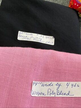 Fabric.  6 1/2 total yards. Pink and black.